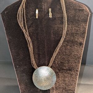 Brown Beaded Multi-Strand Necklace with Textured Silver Pendant